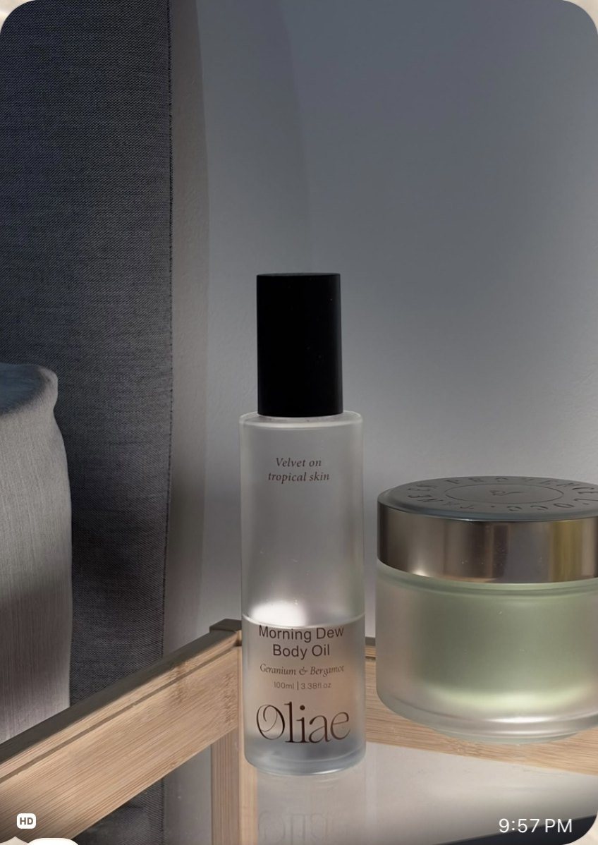 A tester's photo of Morning Dew Body Oil on her bedside shelf